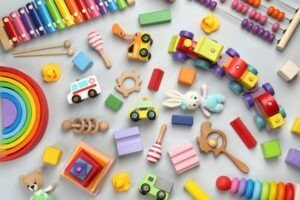 Buntes Babyspielzeug repräsentiert Gegenstände